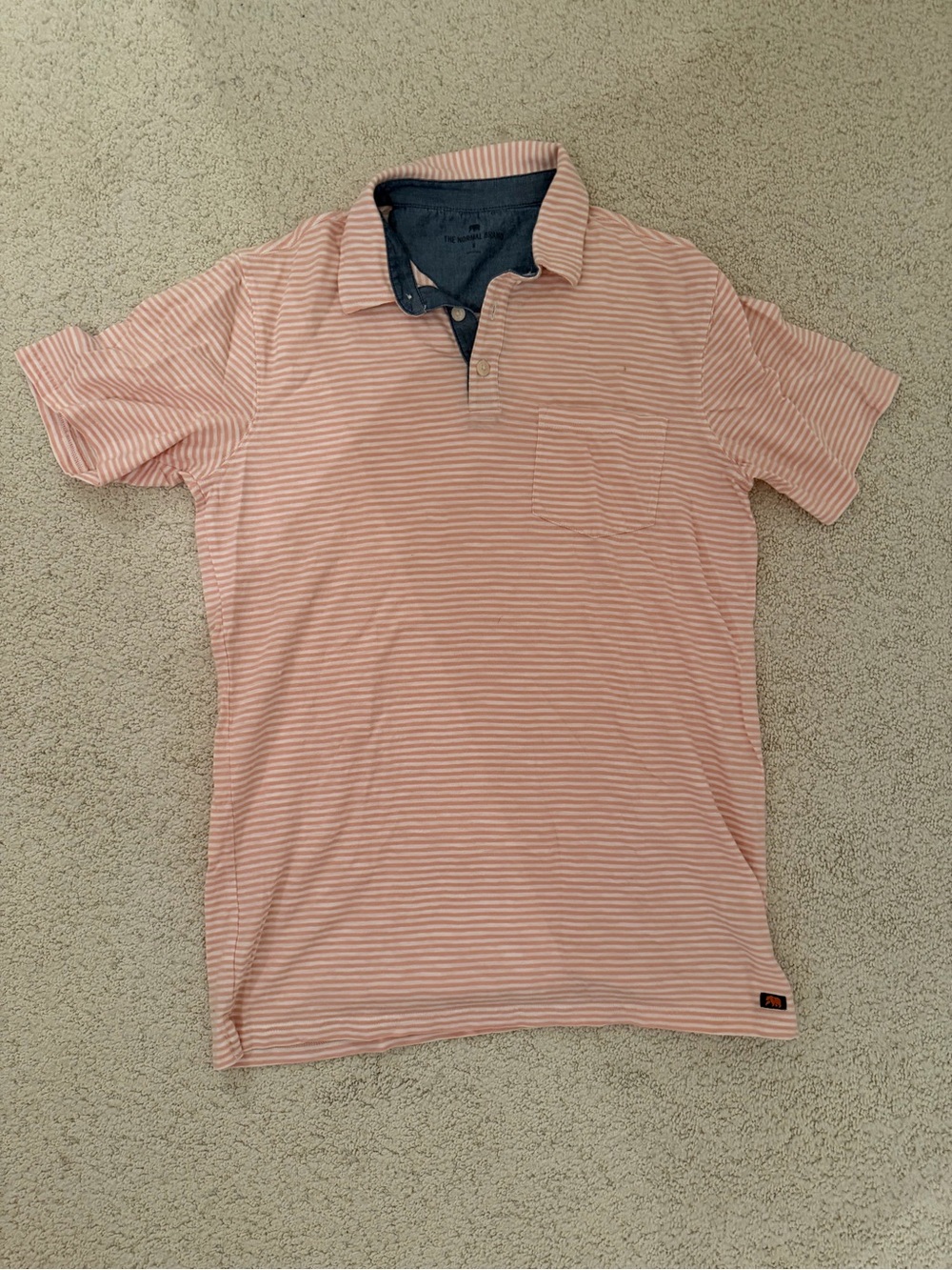 Men’s orange and white stripe cotton polo